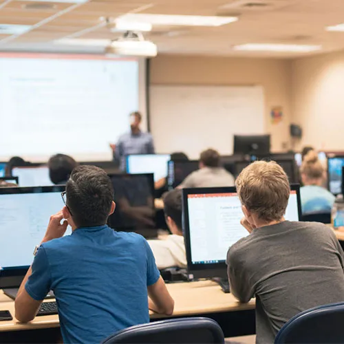 Students at computers in classroom