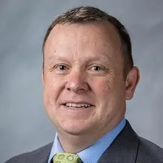 Headshot of Joshua Alcorn