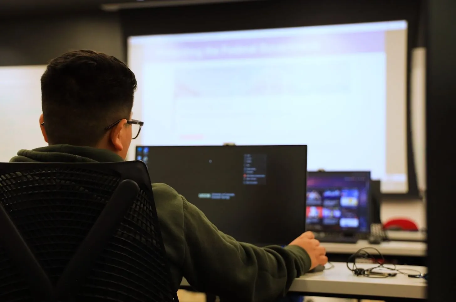 cyber student at computer in classroom