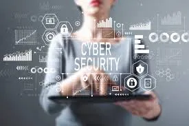 Women in cybersecurity with laptop